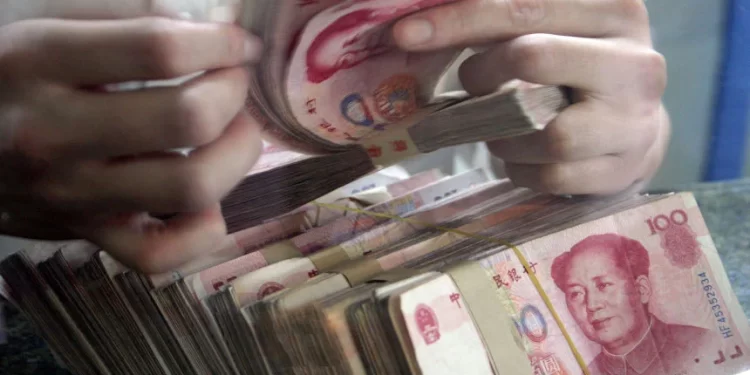 圖為人民幣現金。（Photo by China Photos/Getty Images）