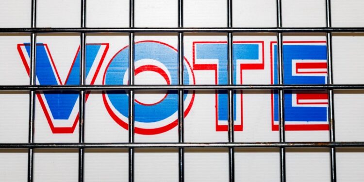 帶有「VOTE」（投票）字樣的招牌。（REUTERS）